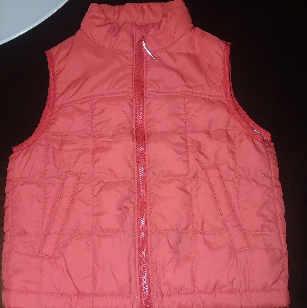 Cute little man vest by Uniqlo